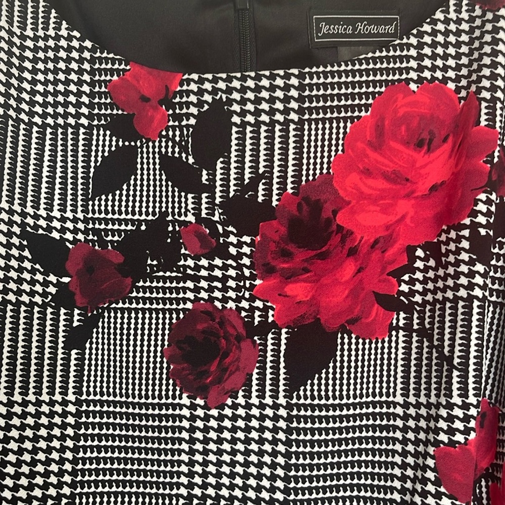 Black and white dress with red flowers.
